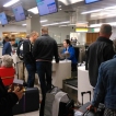 Inchecken en bagage inleveren op het vliegveld